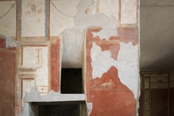 Detail of a Roman fresco with remnants of architectural decoration.