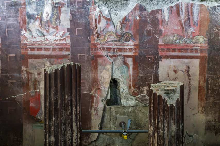 Mythological fresco with damaged columns in the the House of Thiasus in Pompeii