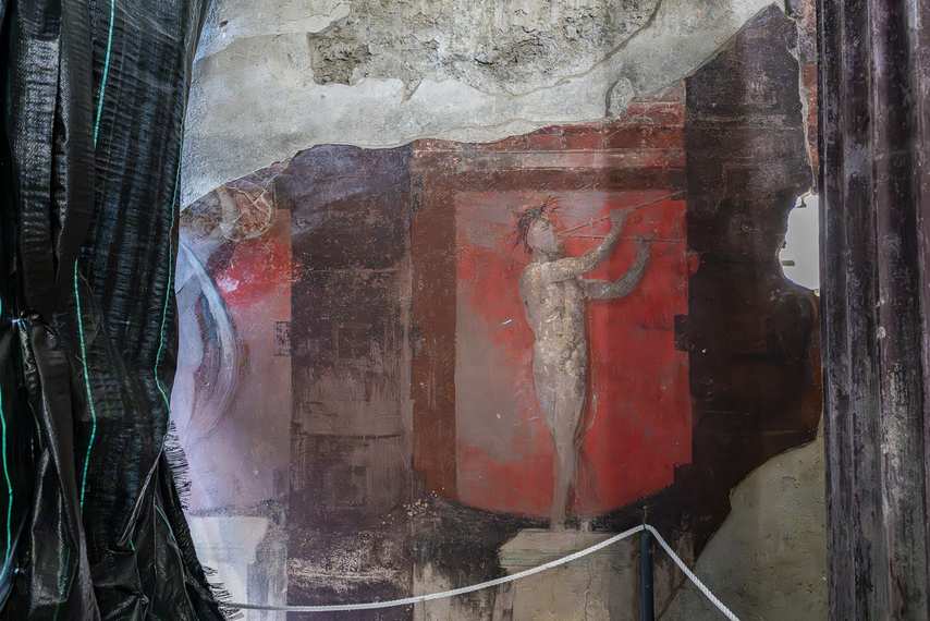 Fresco with figure of Apollo playing a musical instrument in the the House of Thiasus
