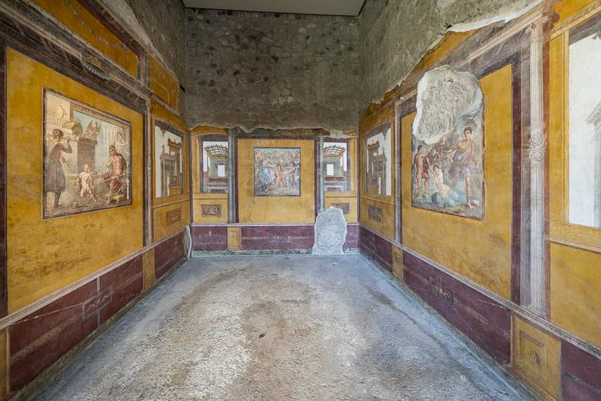 Well-preserved mythological frescoes in the House of the Vettii in Pompeii