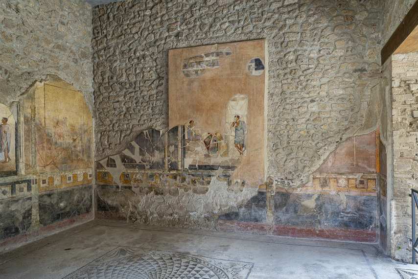 Partially preserved frescoes in the House of the Golden Cupids in Pompeii