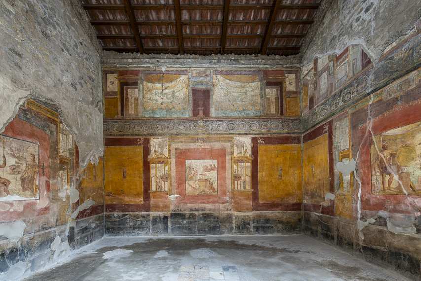Wall decorated with Roman frescoes in the House of Sirico in Pompeii