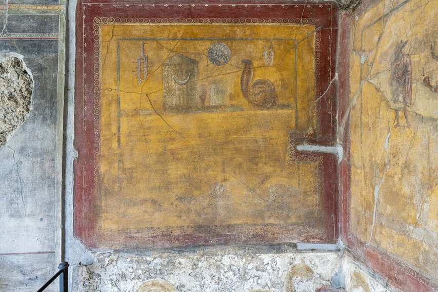 Still life fresco with objects and animals in the House of the Golden Cupids in Pompeii