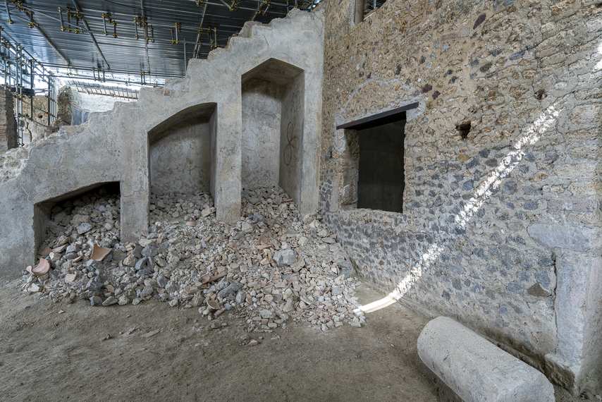 Detail of excavation and rubble piles inside the House of Thiasus
