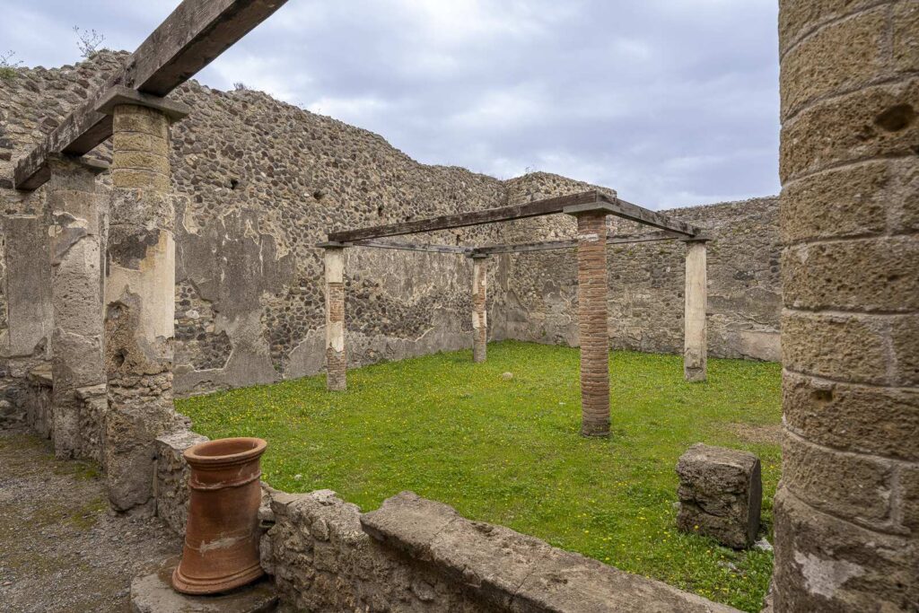 Indoor garden with columns and pergola in the House of Siricus in Pompeii
