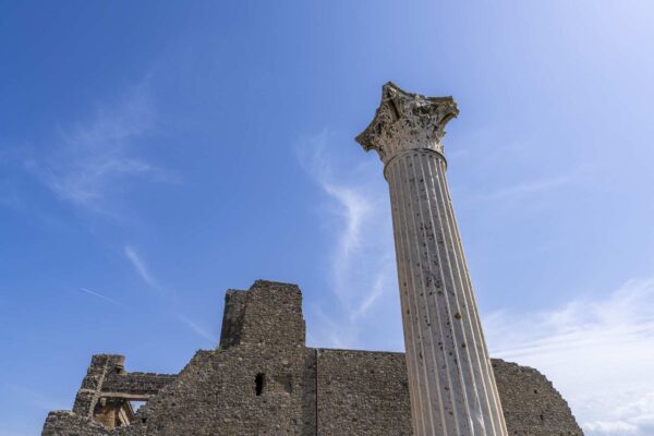 Corinthian column and ruined temple at the Shrine of Venus in Pompeii