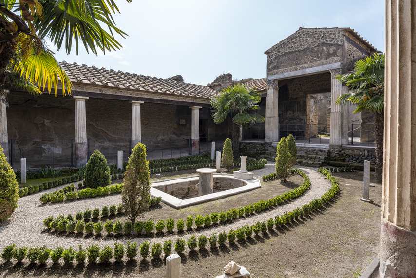 Garden with central fountain in the House of the Golden Cupids in Pompeii