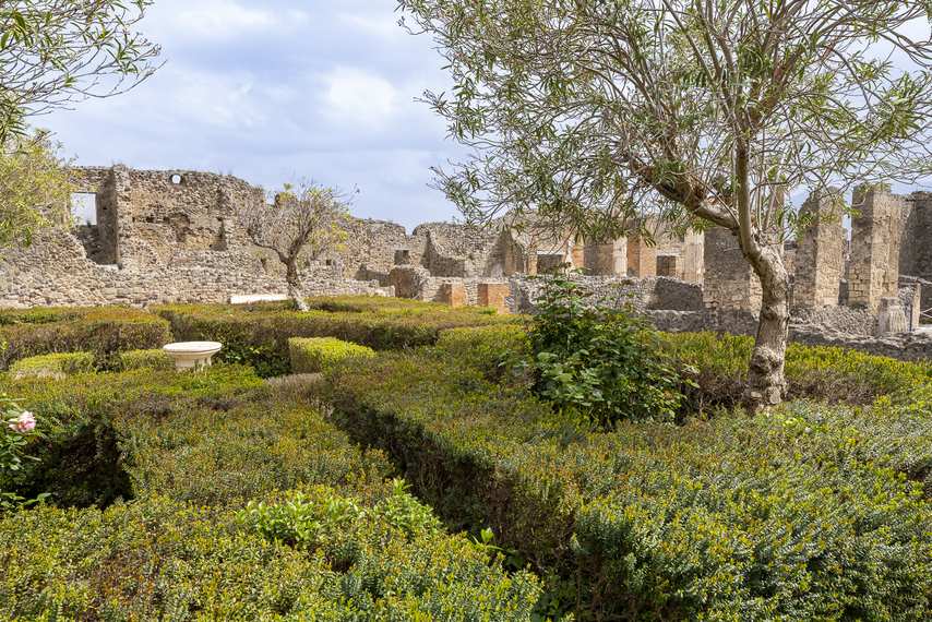 House of the Faun garden with hedges and trees