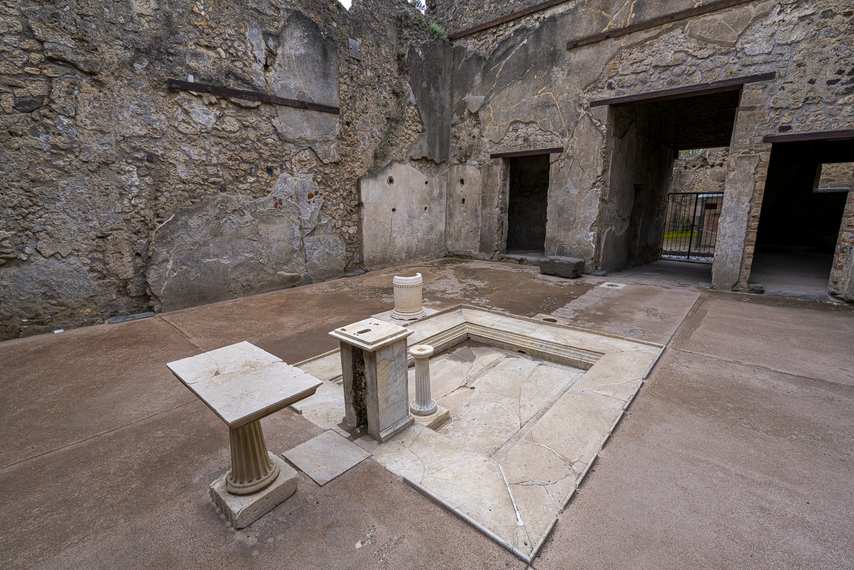Impluvium with marble columns in the House of Sirico in Pompeii