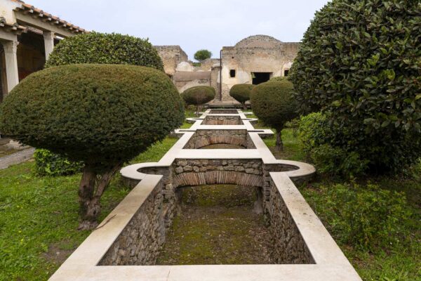 Well-tended garden with shaped hedges in Julia Felice's Praedia