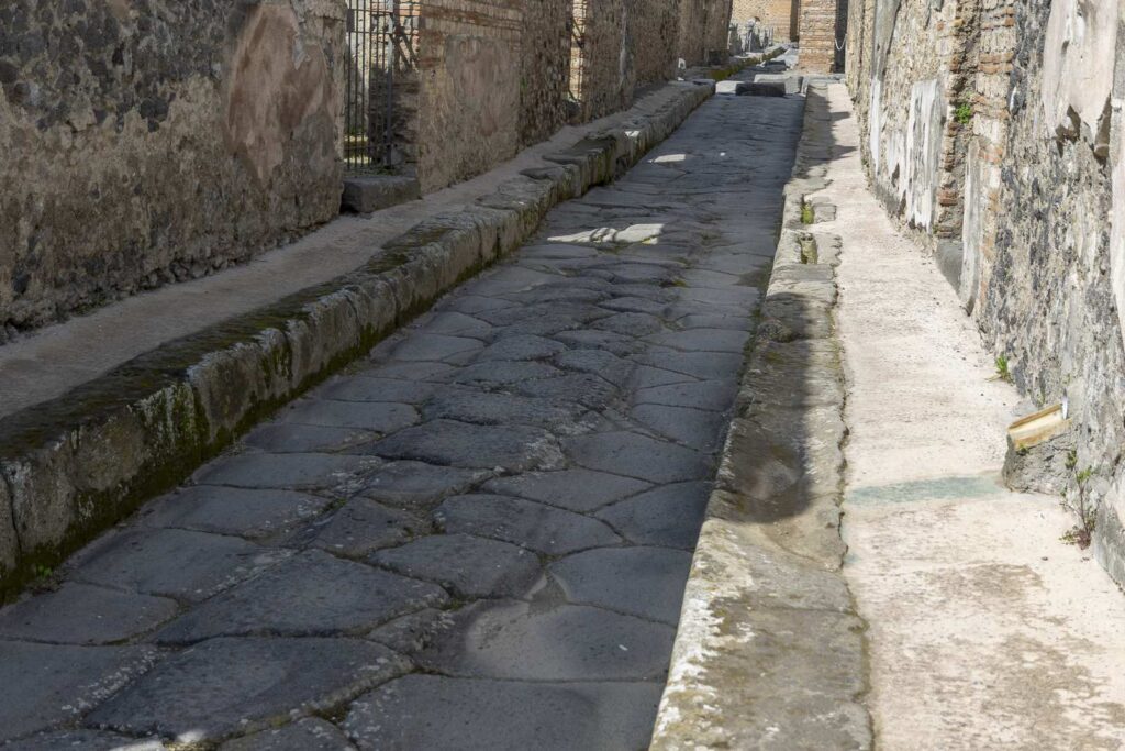 Well-preserved Roman road in the ruins of Pompeii