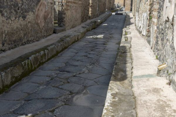 Well-preserved Roman road in the ruins of Pompeii