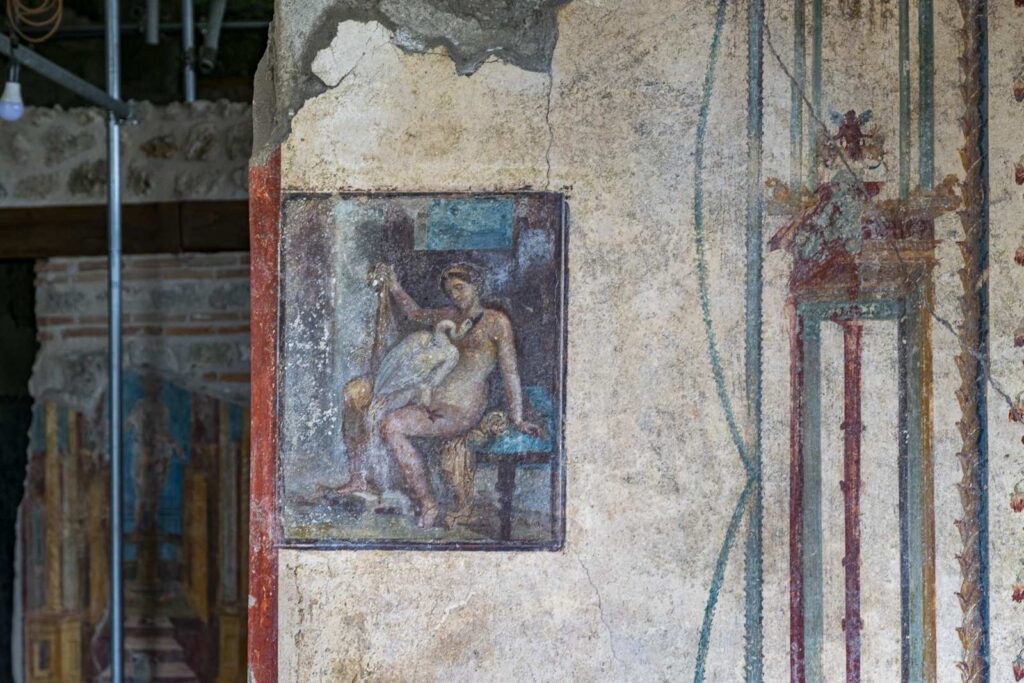 Roman fresco of Leda and the Swan in the House of Leda in Pompeii, showing Leda seated as the swan—Zeus in disguise—approaches her.